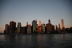 05 The First Rays Of Sunrise Shine On New York Financial District Skyline From Brooklyn Heights